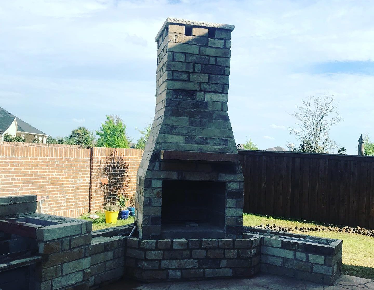 Custom fireplace by Impact Landscapes